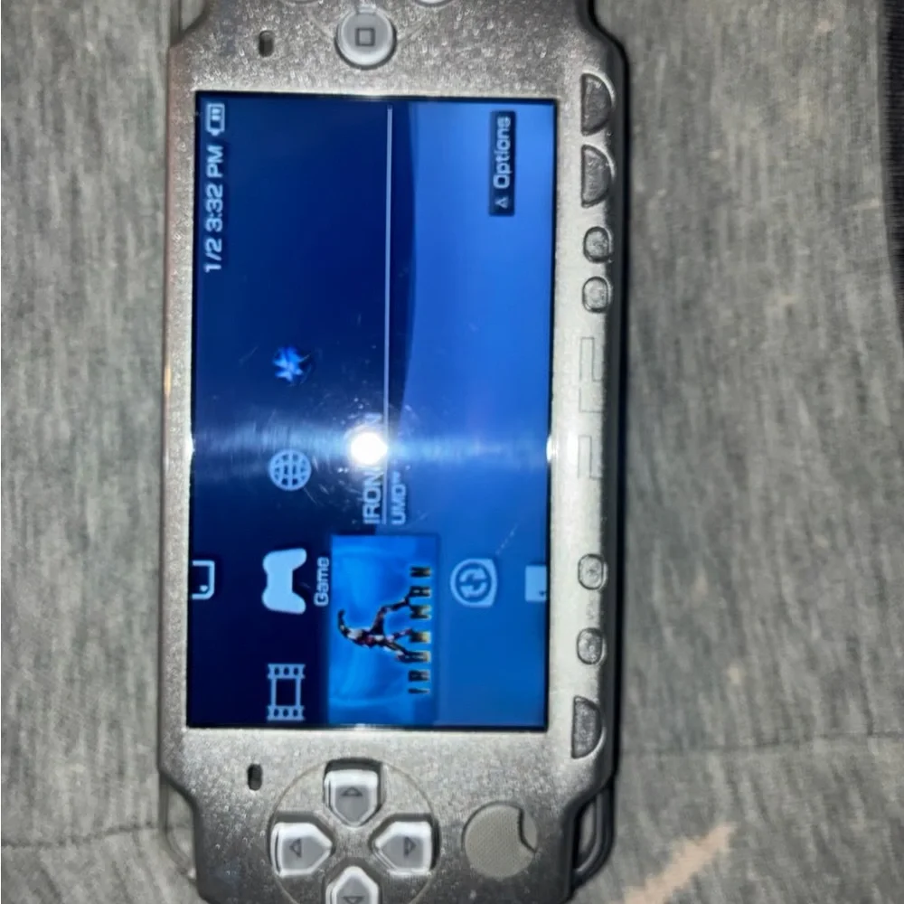 Sony Silver Handheld Console with Charger